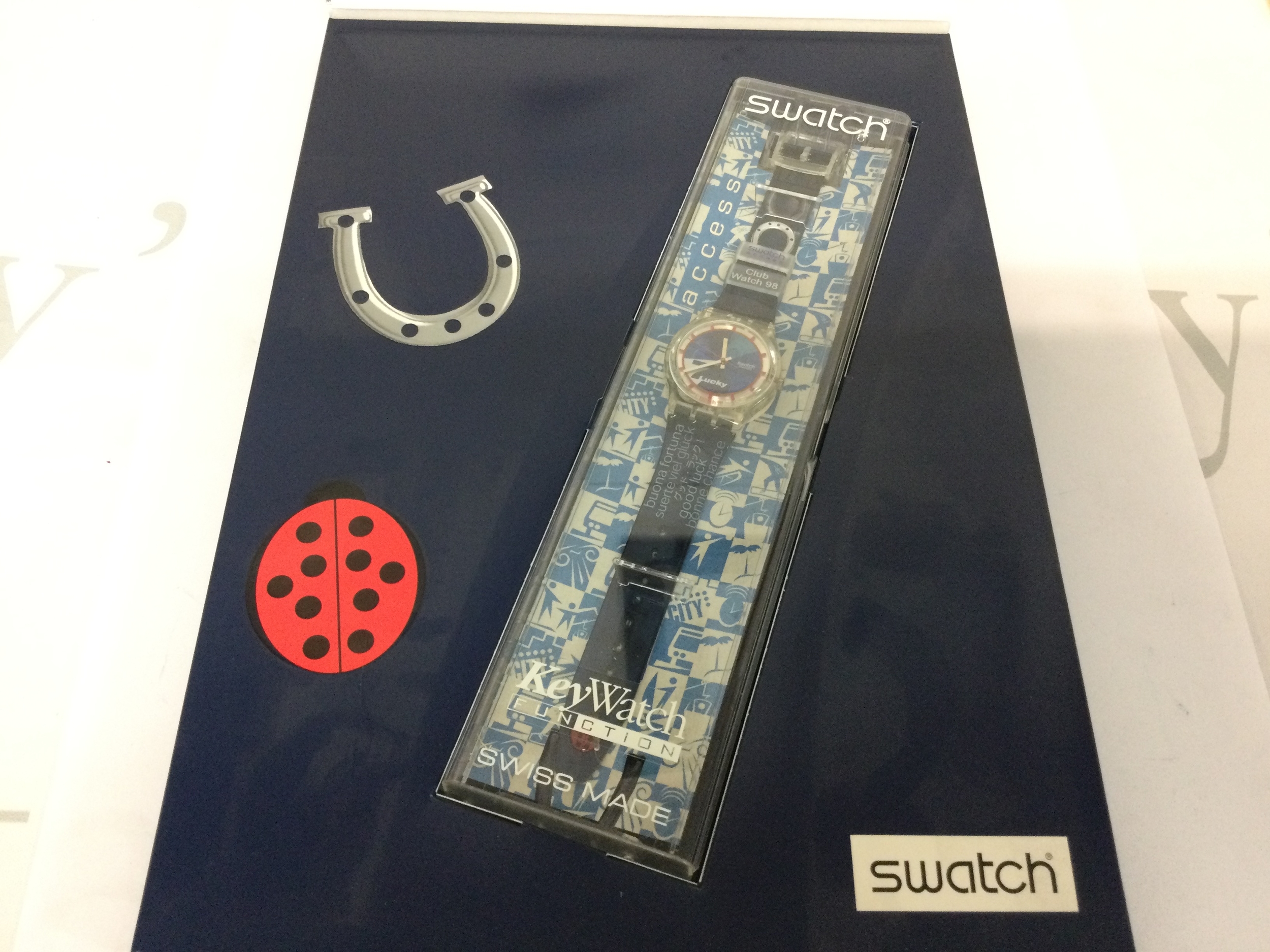 1998 Swatch special access lucky 7 watch with its packaging.