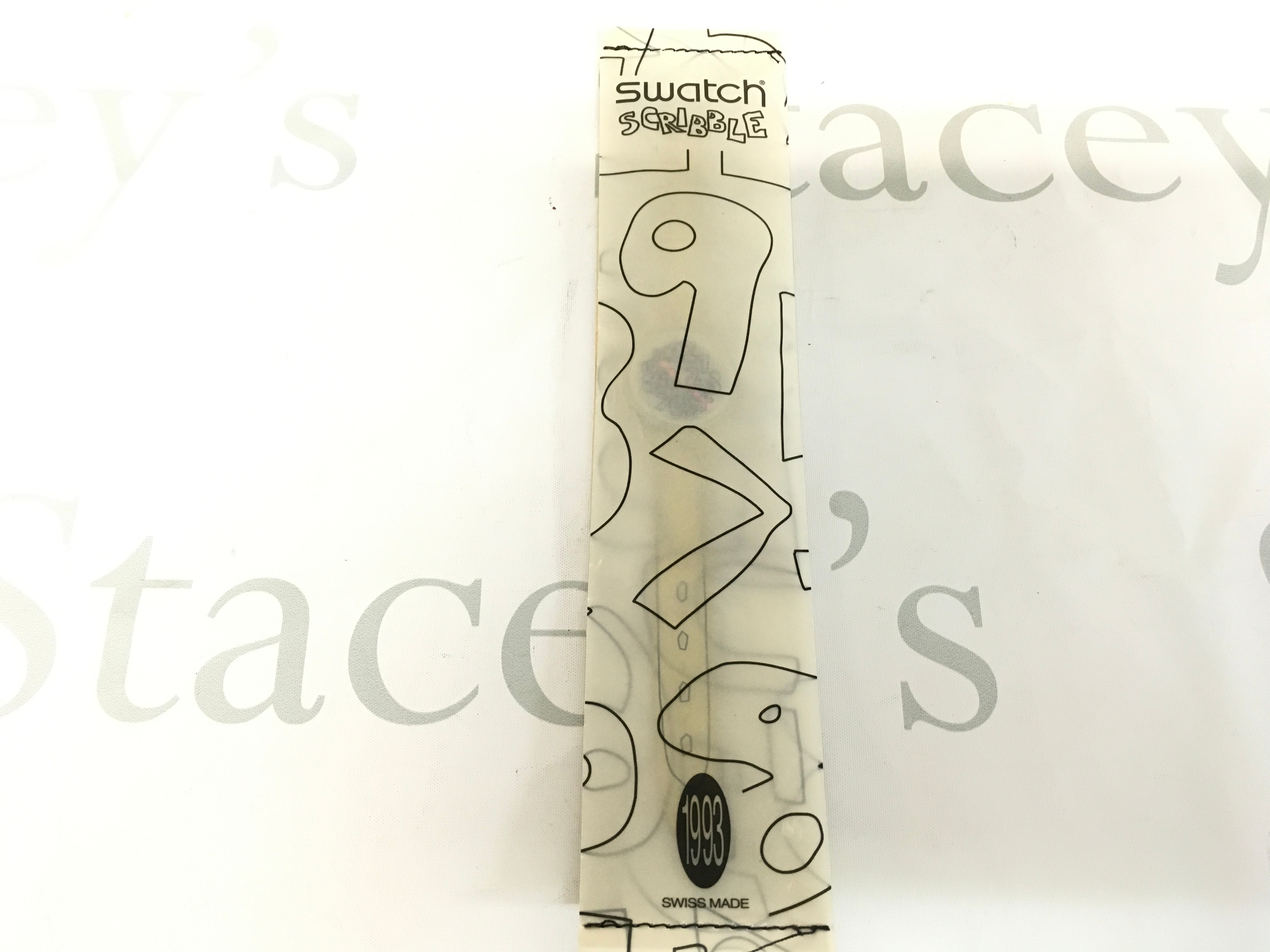 Swatch Scribble (GZ124) collectors club watch from 1993. The wristwatch features a distinct black-and-white scribble design on the strap and case.