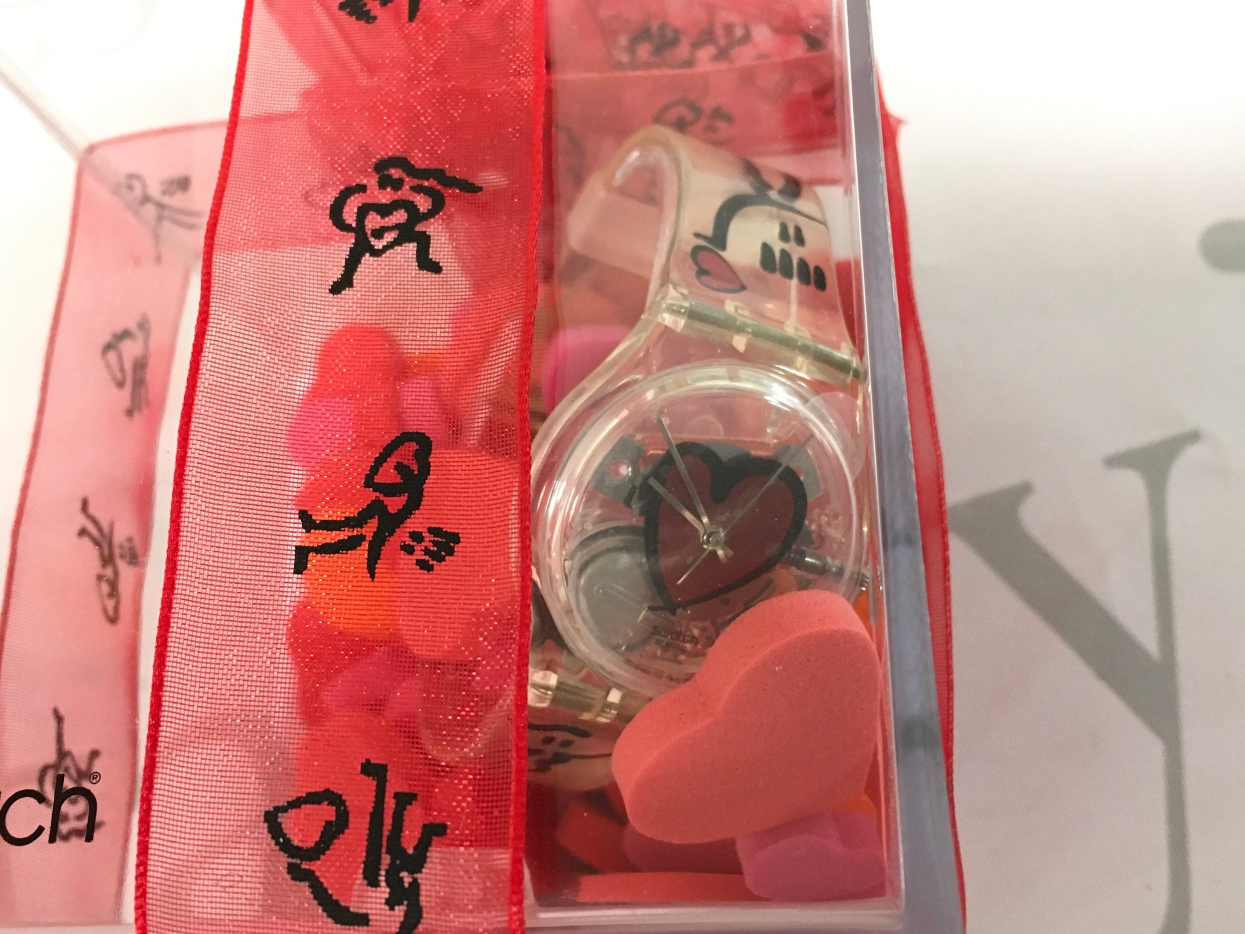 1997 vintage Swatch "Pounding Heart" (GK237)watch, featuring a transparent case and a unique heart-themed dial design