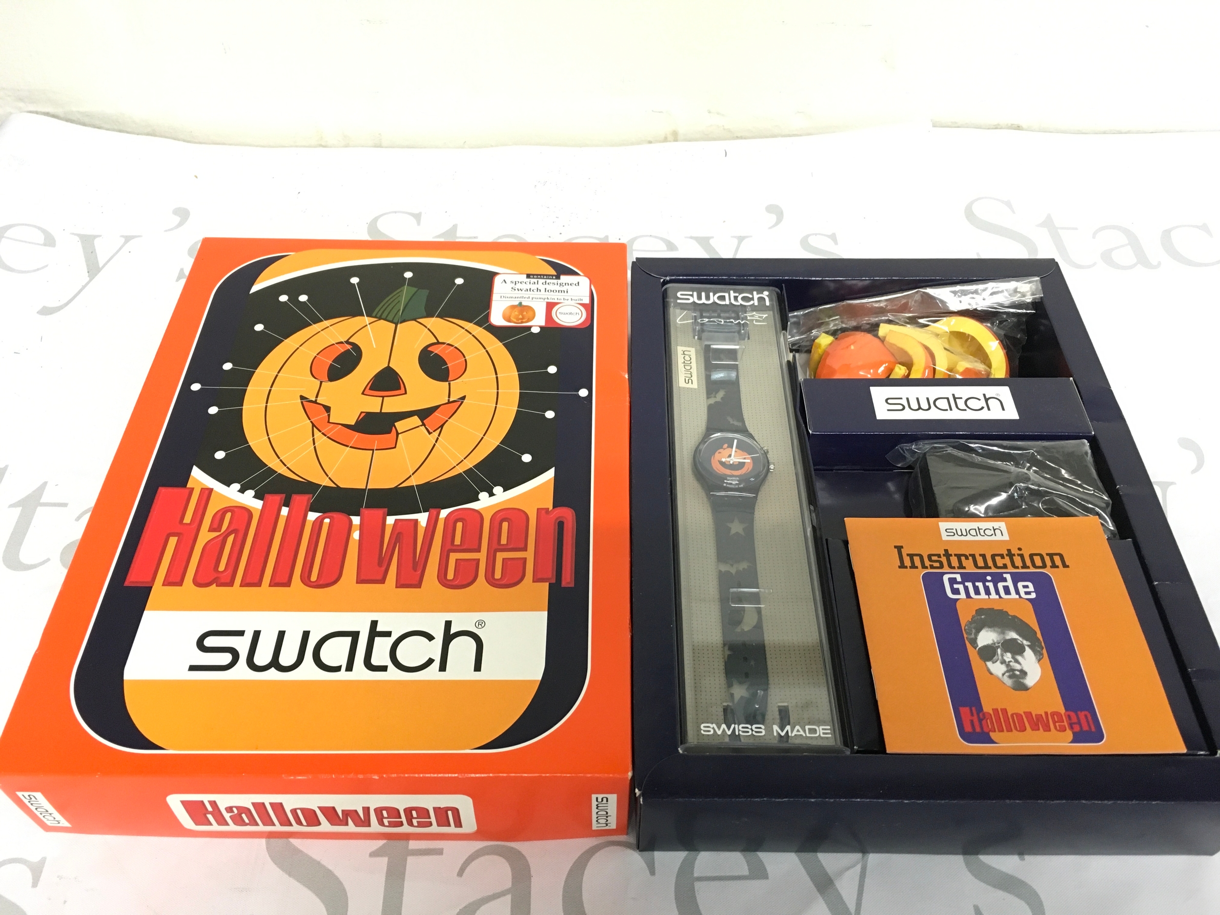 1998 Swatch "Happy Nightmare" Halloween special edition watch (model GN906) featuring a pumpkin dial, set in its original thematic packaging.