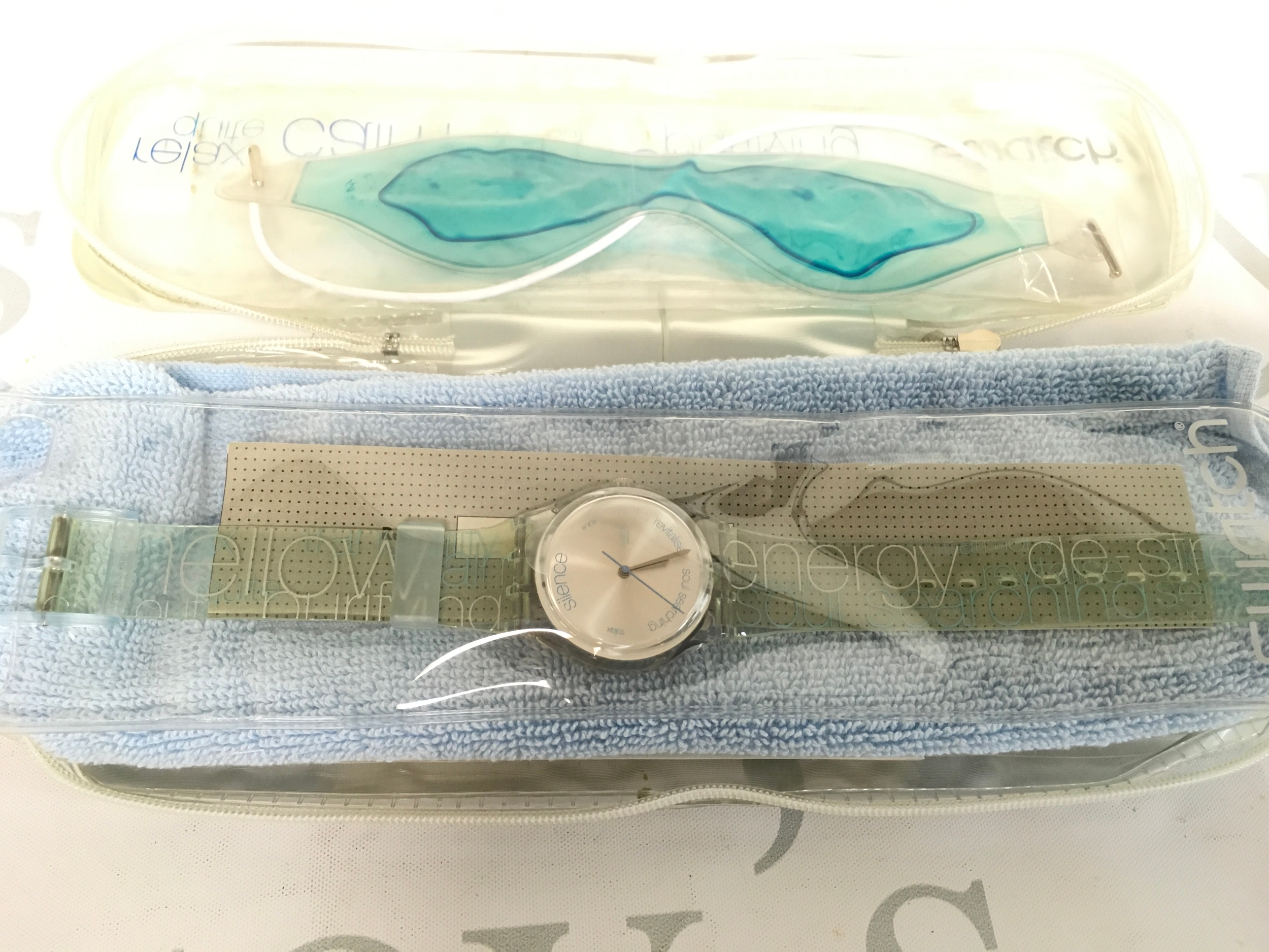 2002 Swatch "Don't Disturb" watch (model GN203), which features a transparent strap and a silver dial.