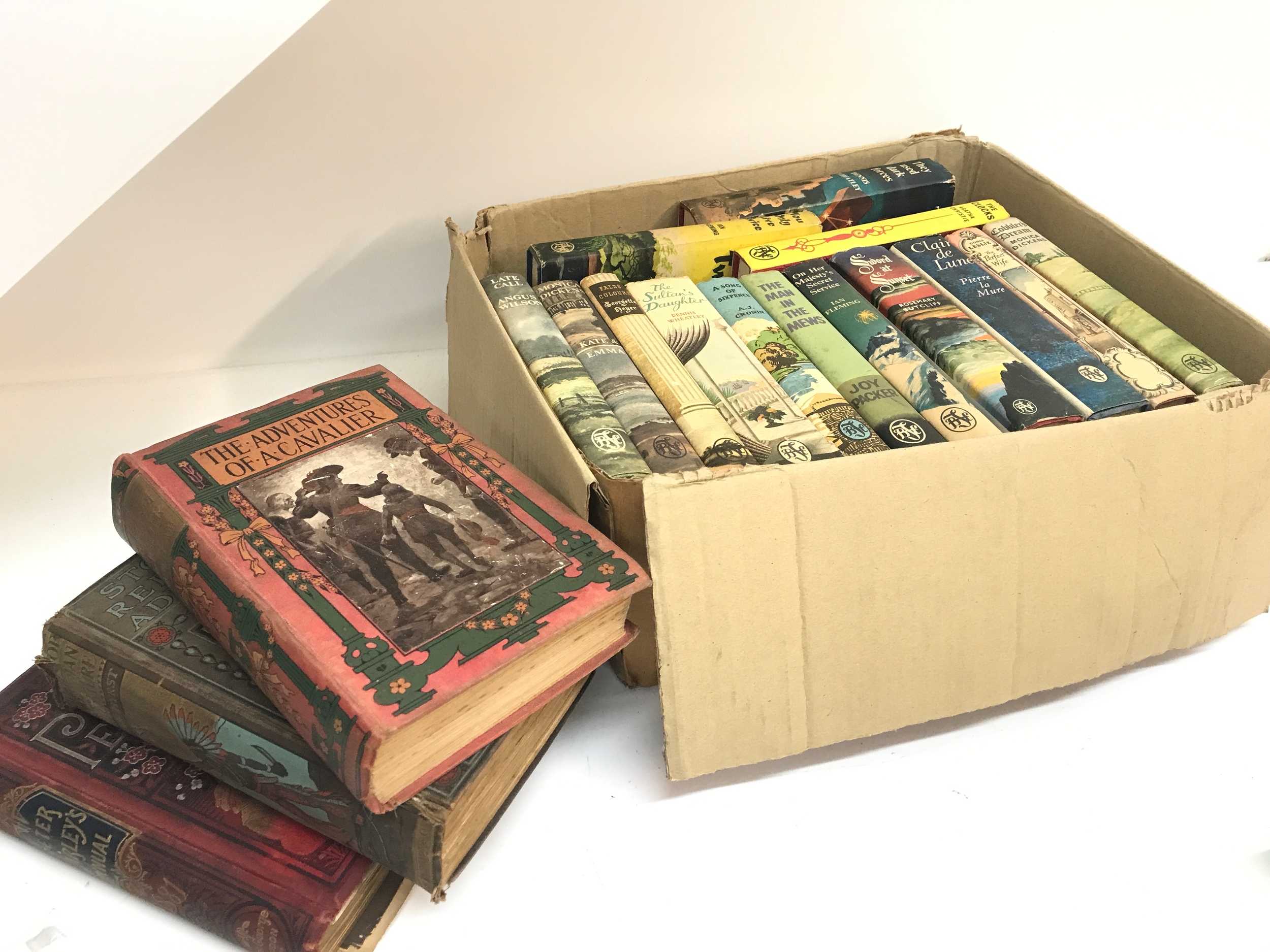 A box of books 1963-64 with dust covers including Ian Fleming You Only Live Twice, On Her Majesty's Service and other titles, three late Victorian/Edwardian books 