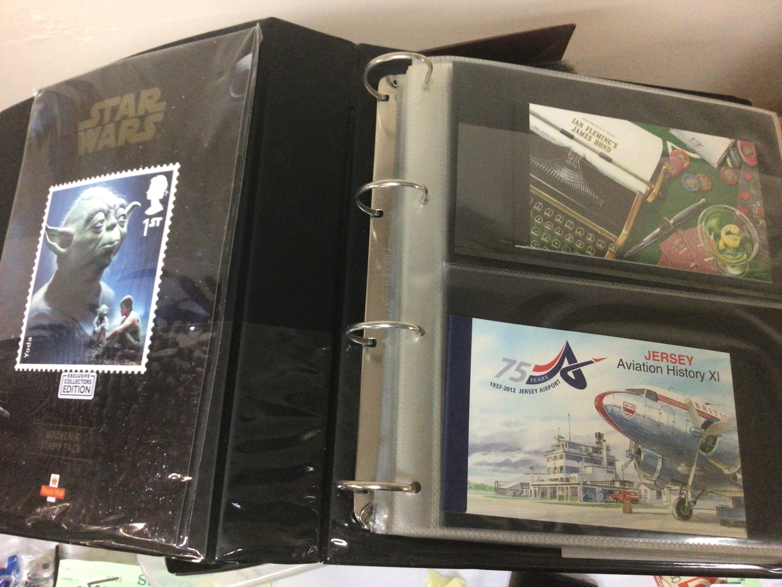  A collection of five albums containing a combination of First day covers including pre decimal covers presentation packs coincided with covers and unused pictorial stamp books.