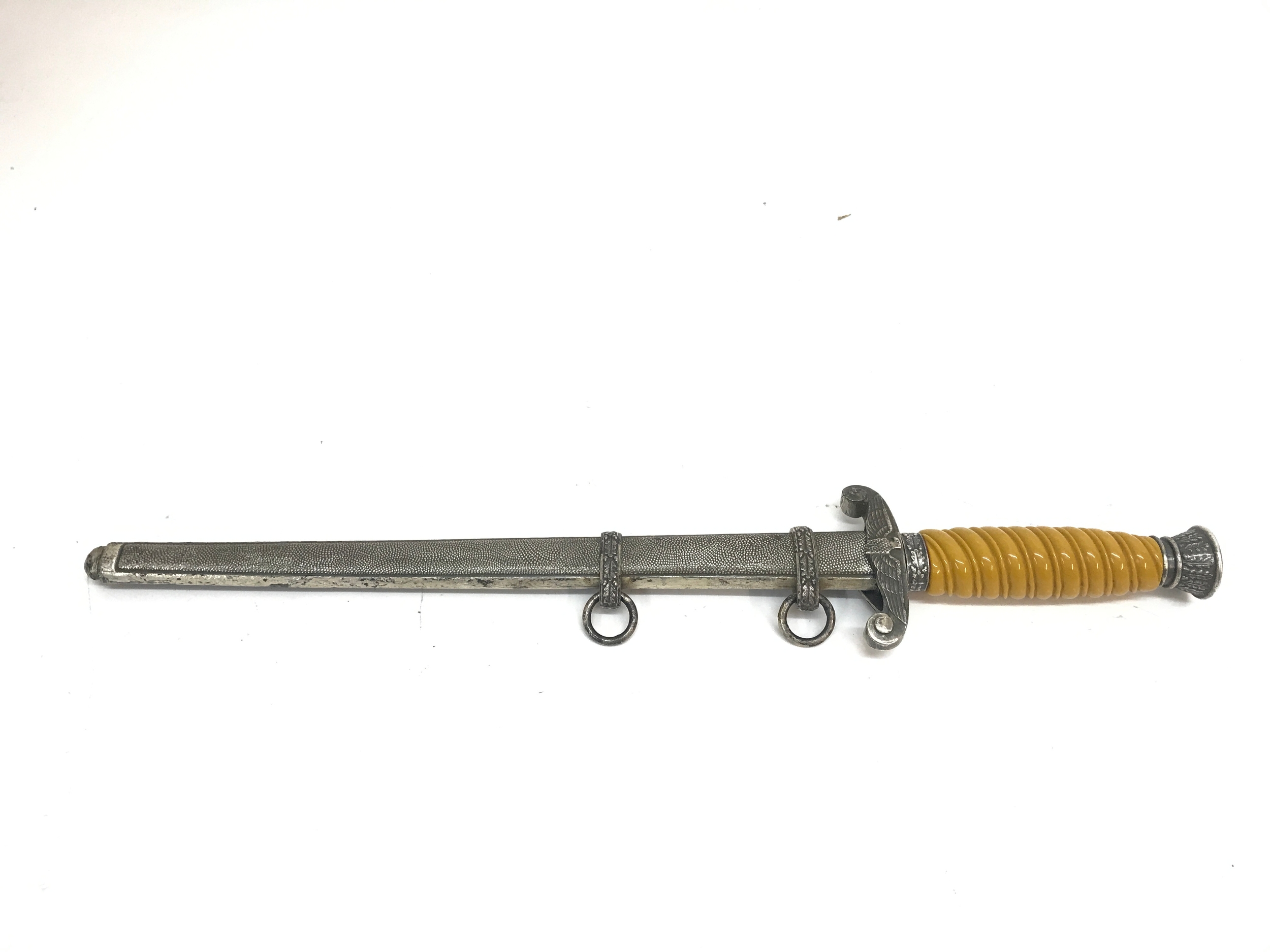 A World War II German Army Officer's Dress Dagger, 25cm long blade 37cm total length. Blade marked F.W H.O.LLER SOLINGEN. Damaged swastika 