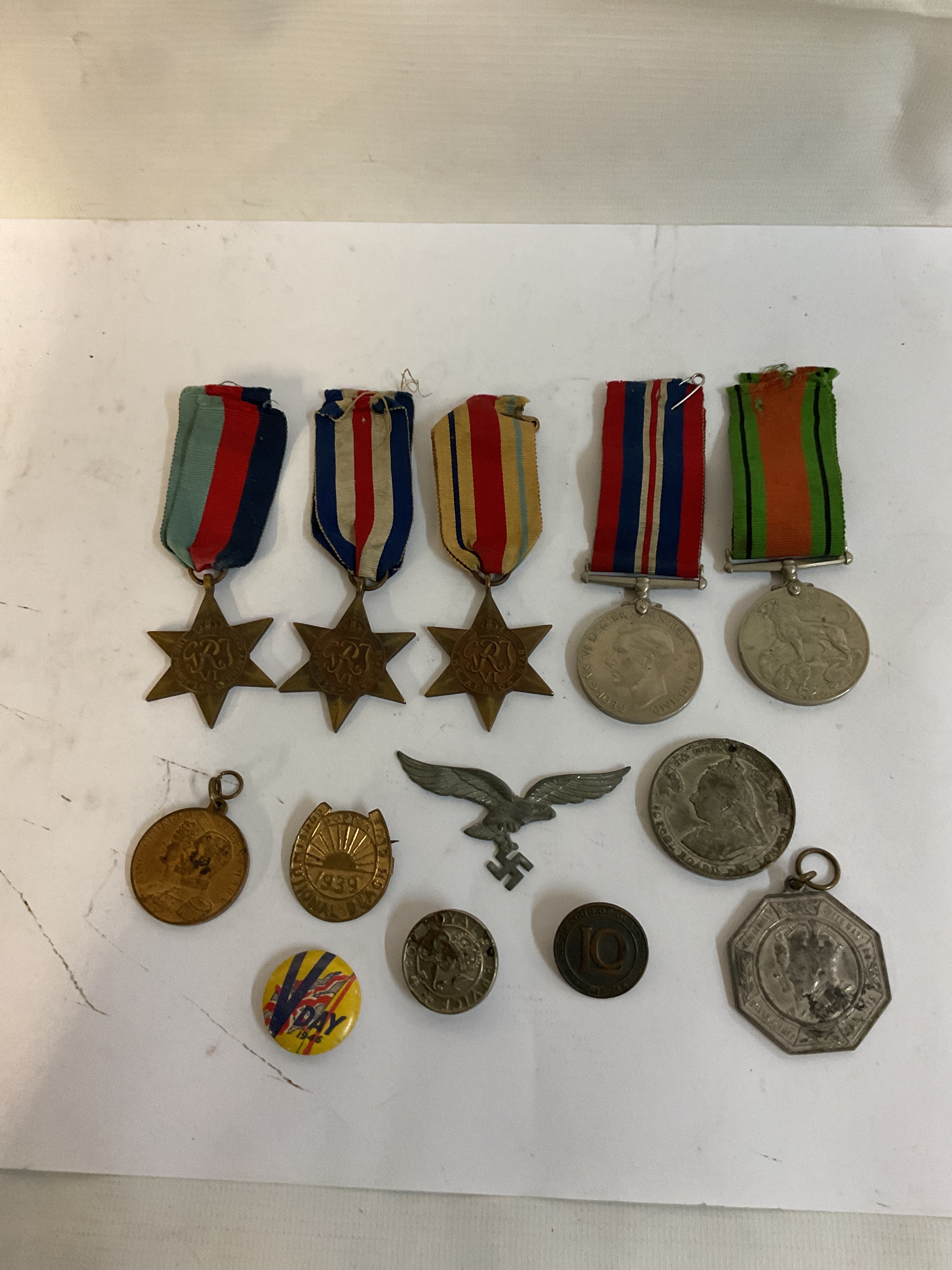 WWII Medals to inc, DM, BWM, F&G, Africa, 39-45 star, along with WWII Luftwaffe wings and badges and medallions.