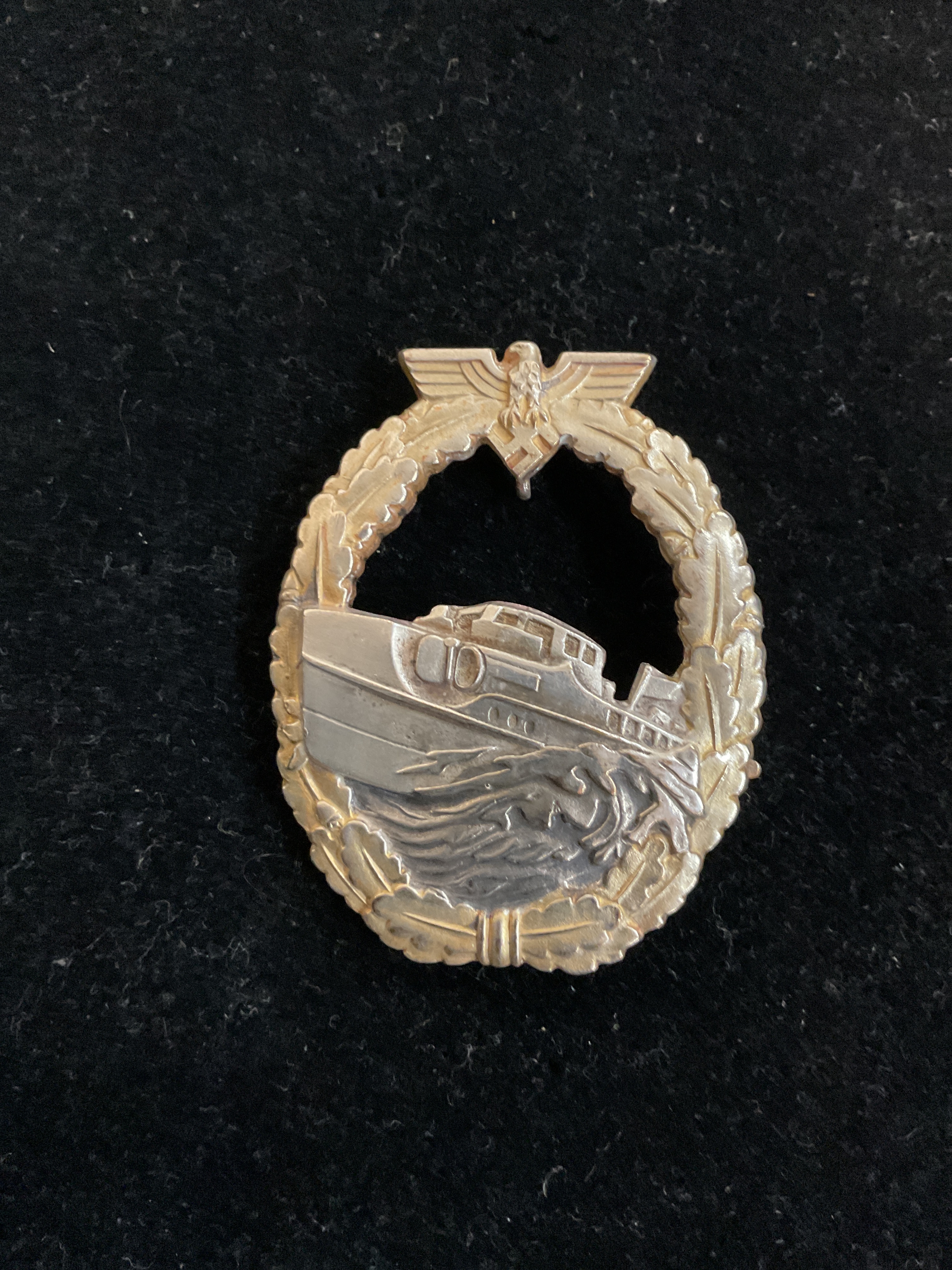 WWII German Kriegmarine E-boat breast badge, cast makers mark Schwerin of Berlin 68, with horizontal broad pin.