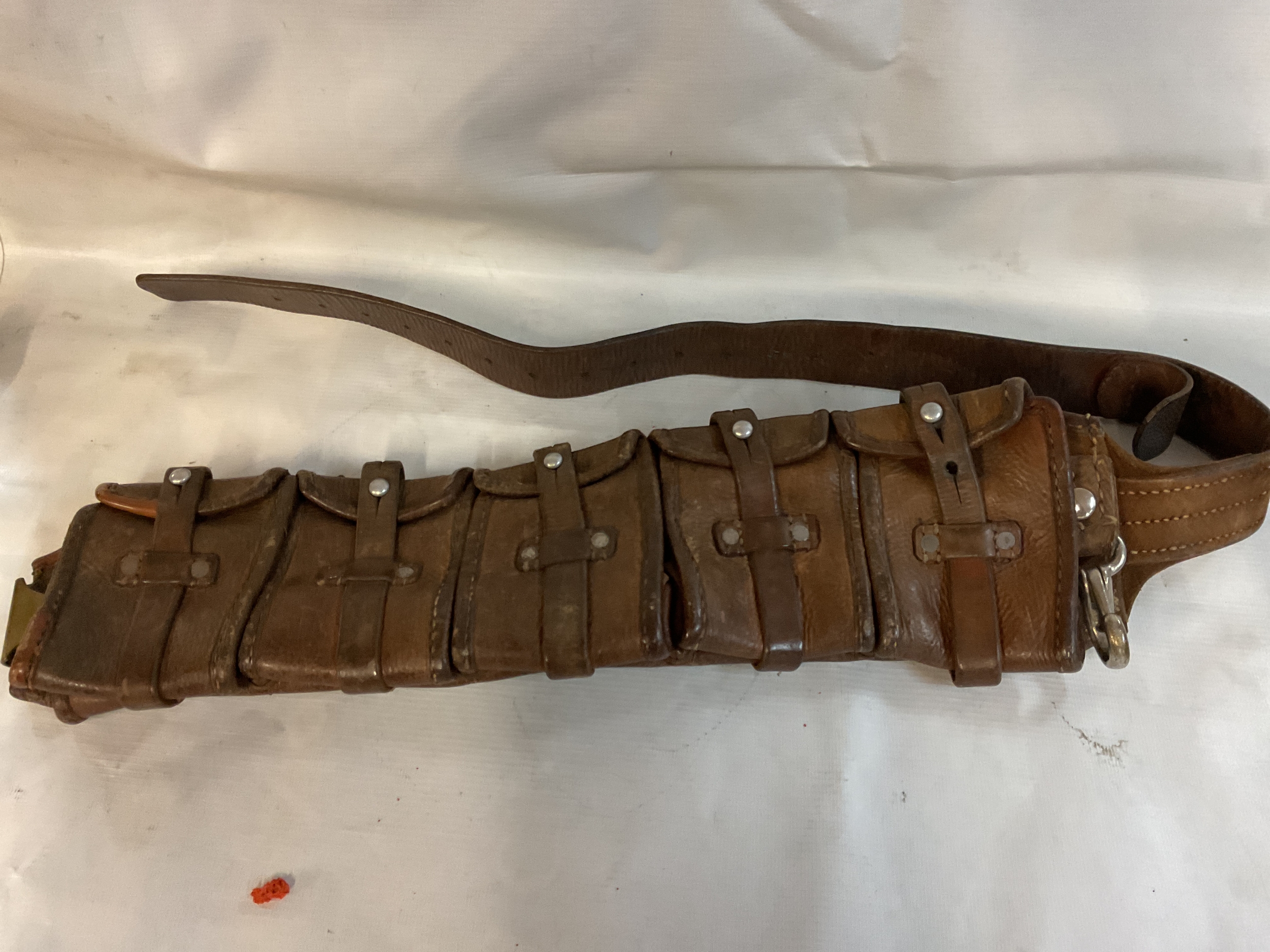 WWI Imperial German five pouch leather bandolier with marks impressed.