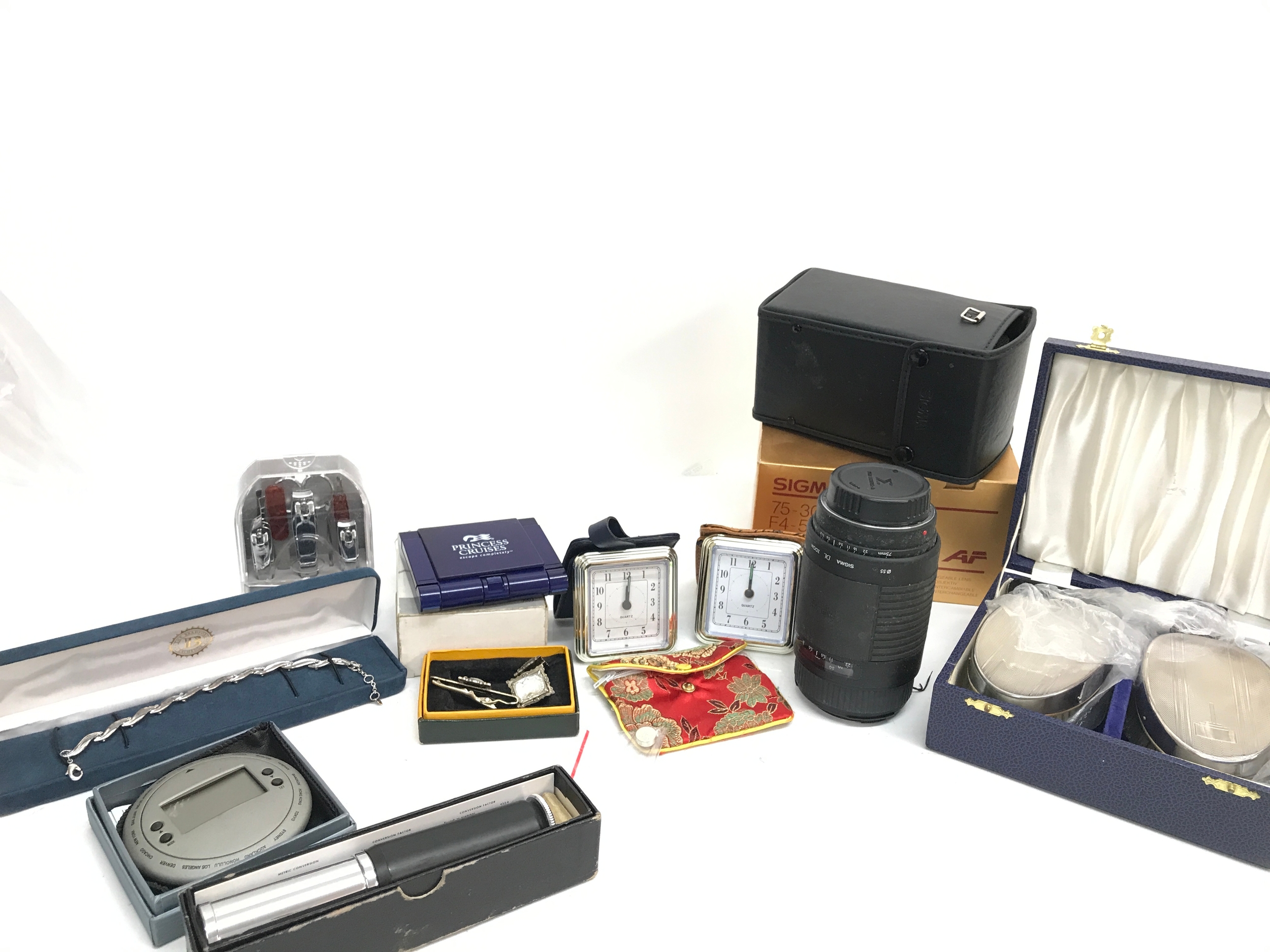 A Sigma 300mm boxed camera lens , EPNS brush set and other items 