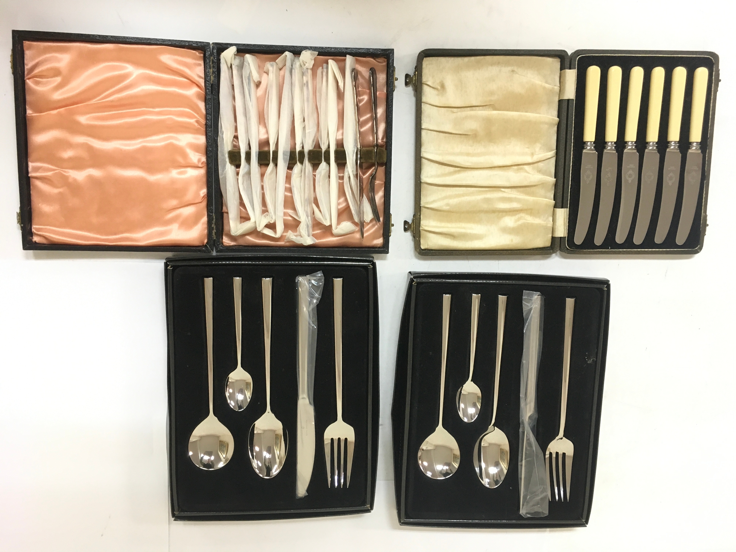 4 sets of knives, forks and 2 sets of Royal Doulton 5 piece cutlery set. All sets include box/ case from which they came with.