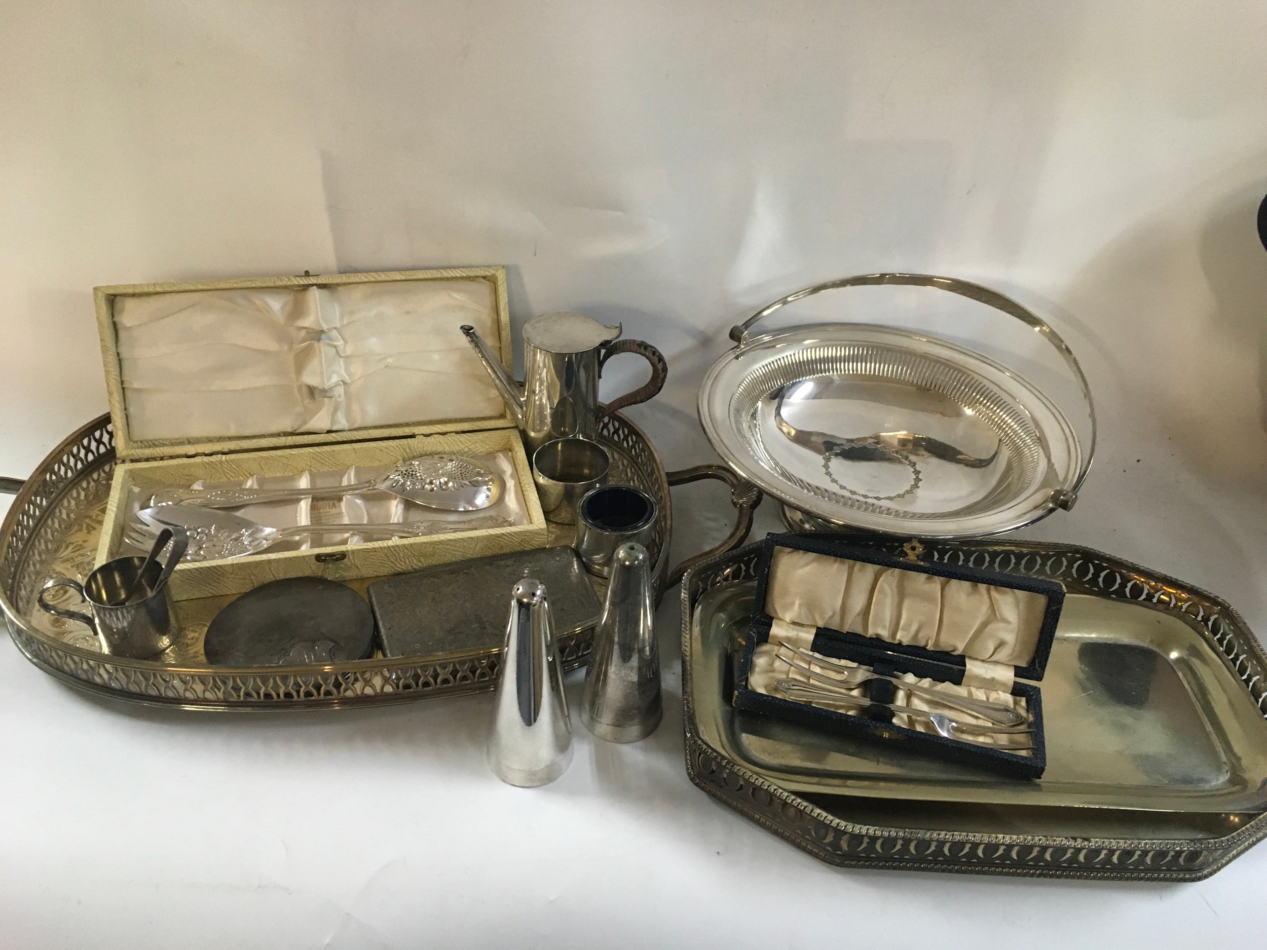 A collection of silver plated kitchen ware including an 835 silver makeup mirror.