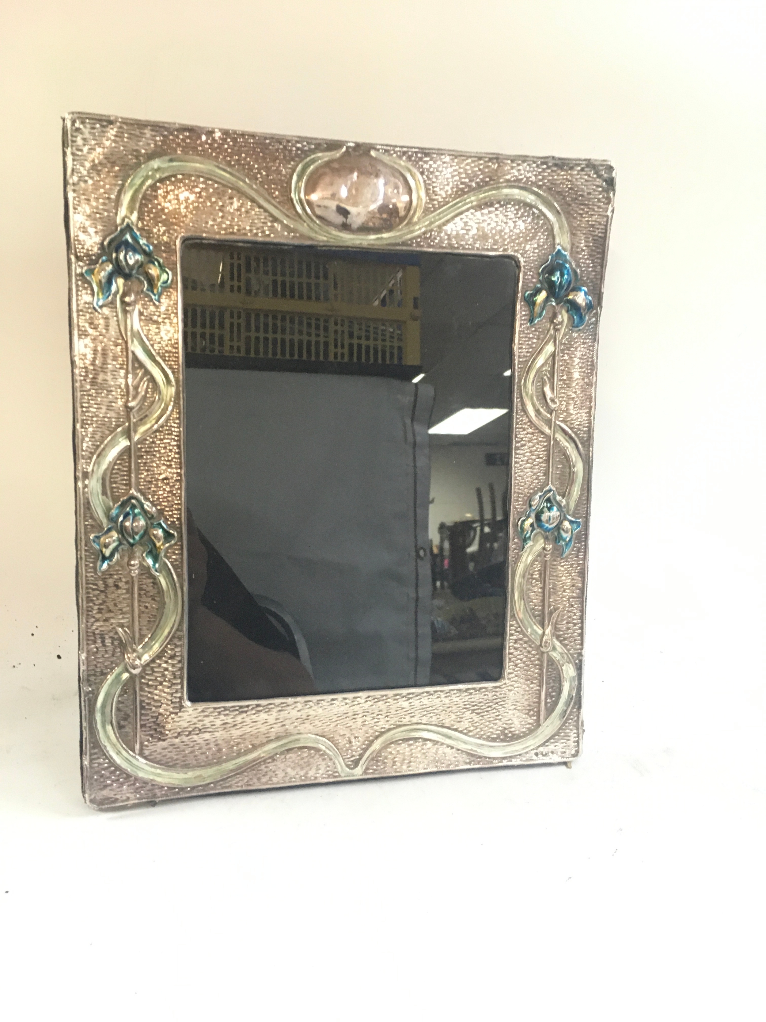 An art nouveau silver frame