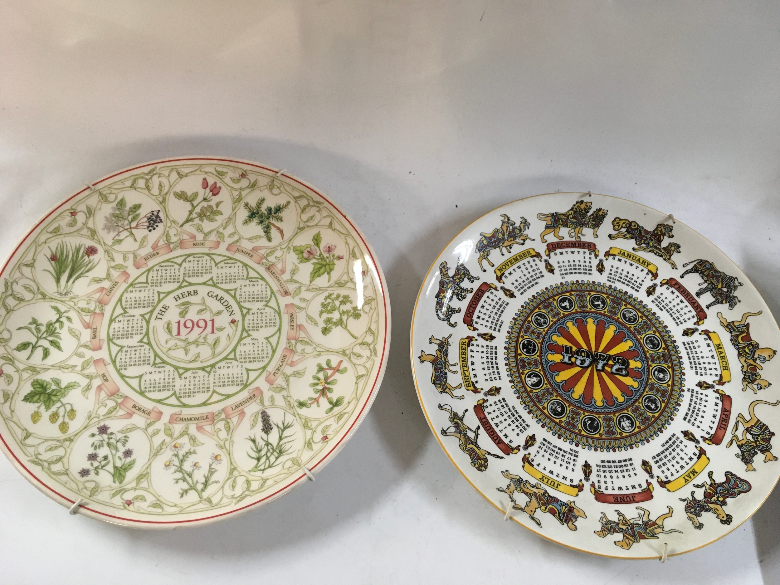 Large collection of plates including calendar plates