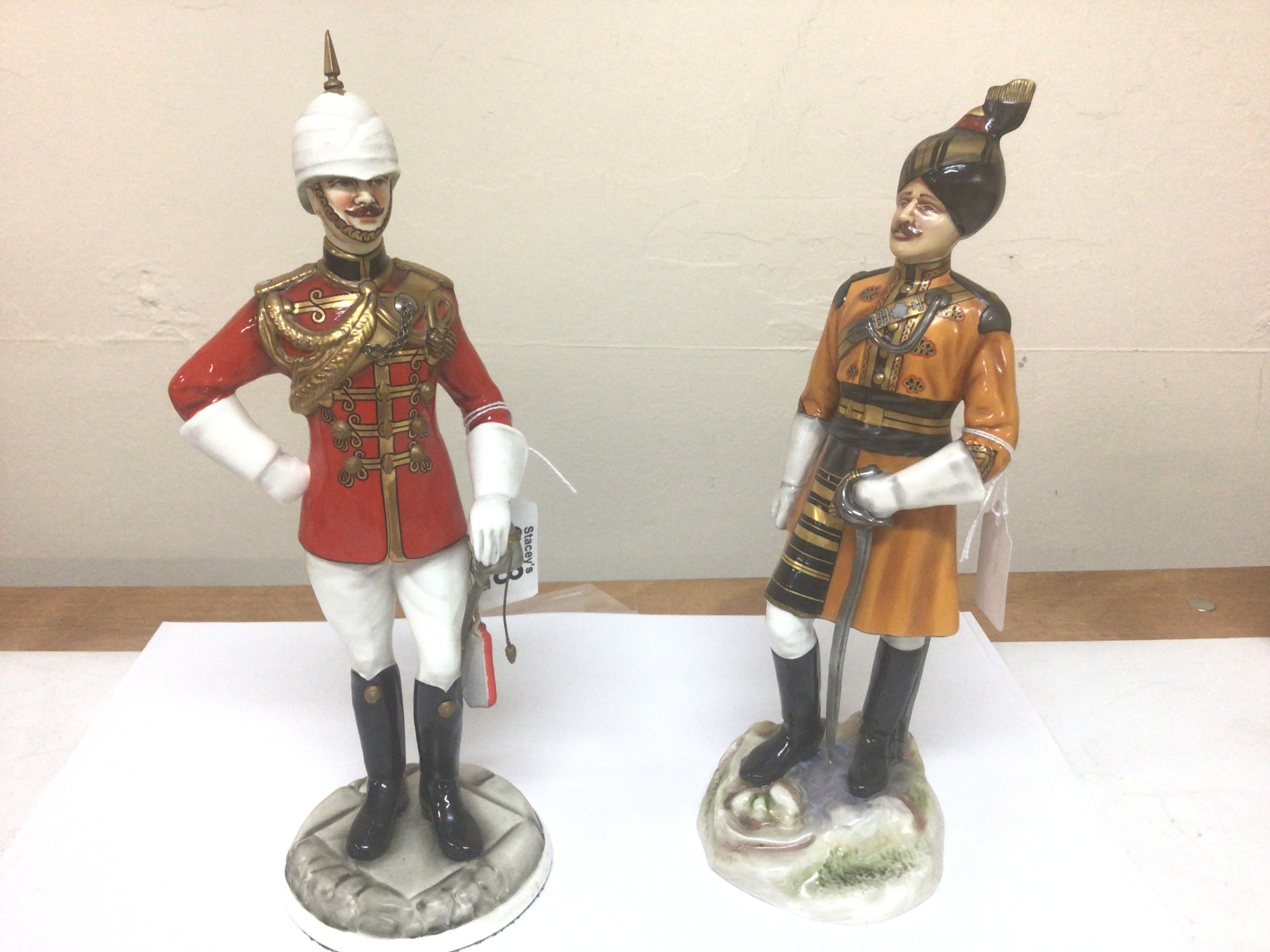 Two detailed porcelain figures by Michael Sutty limited edition figures, Grovernors Bodyguard limited edition number 77 and Skinners Horse 244 no obvious damage (2)