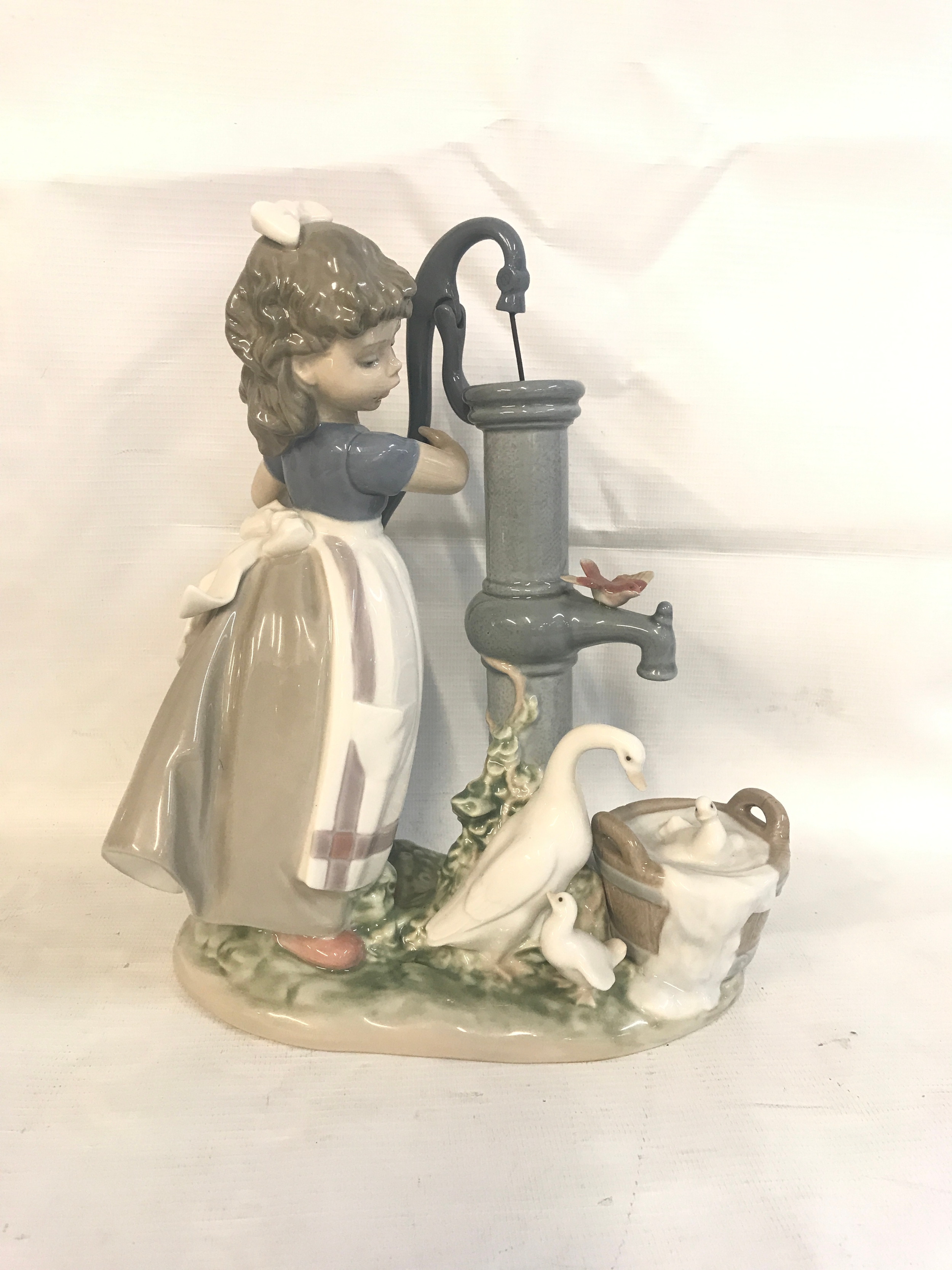  A Lladro porcelain figure "Summer on the Farm" (No. 5285). 23cm tall