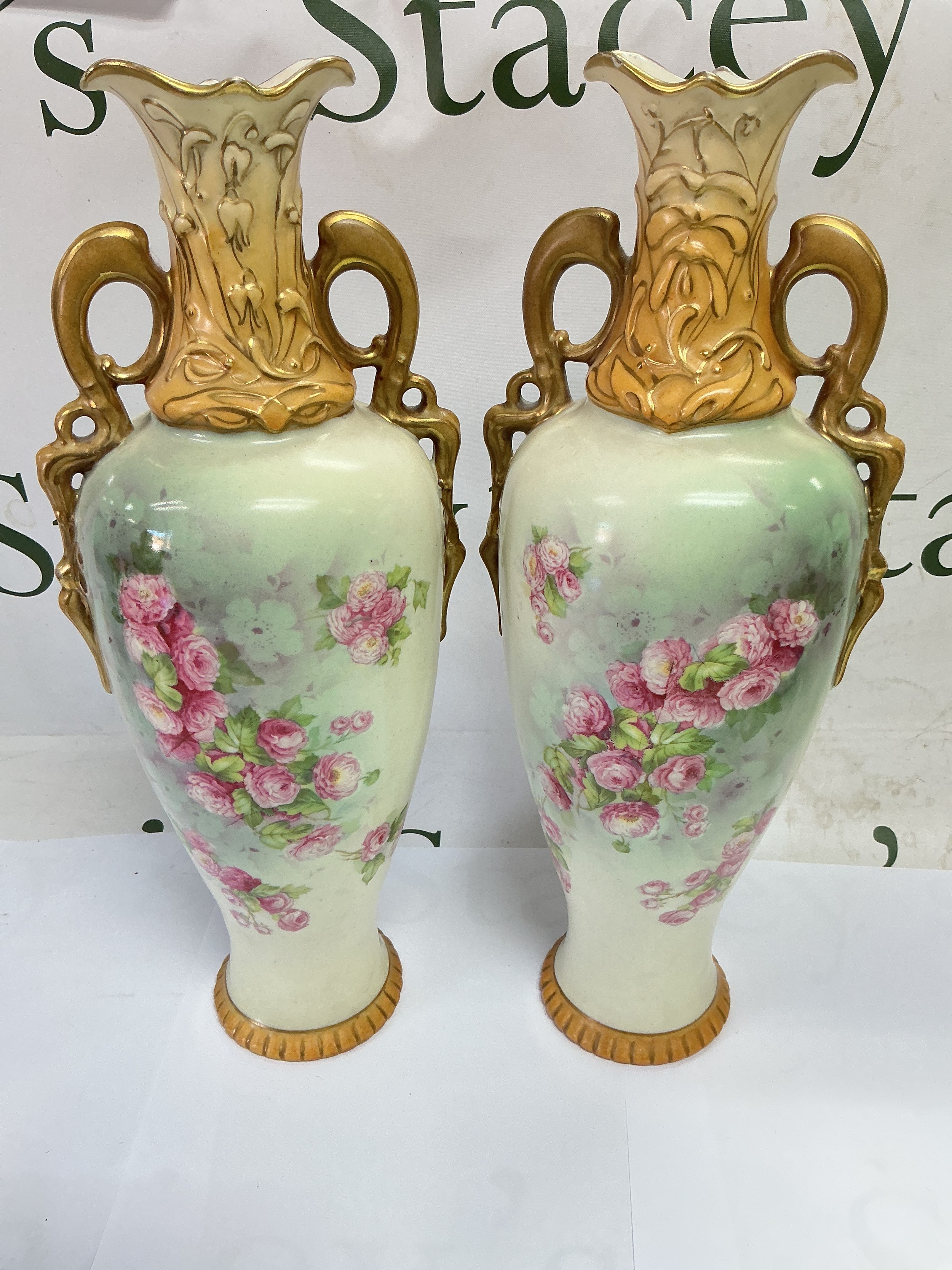 A pair of Royal Vienna vases with floral and giltwork decoration, approx height 35cm.
