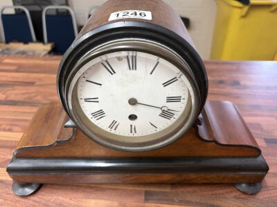 A single fuse mantle clock, with missing hand