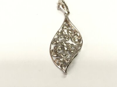 Silver leaf style pendant on silver chain.