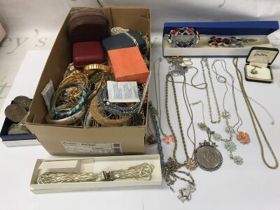A large collection of assorted costume jewellery including silver items. NO RESERVE