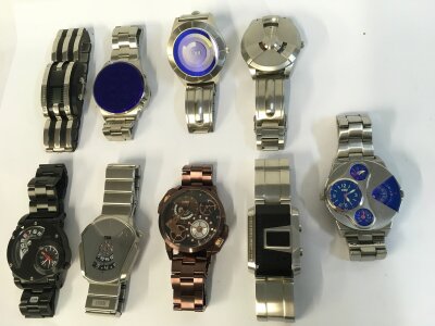 A collection of 9 storm watches of various design.