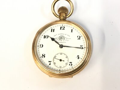 Thos Russell and son gold plate pocket watch. Winds and runs.