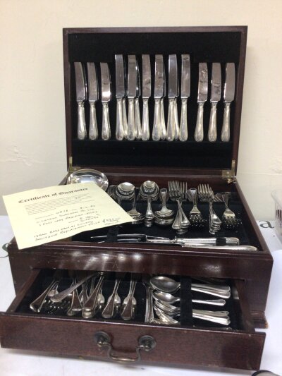 A Mahogany canteen of Sheffield silver plated cutlery.