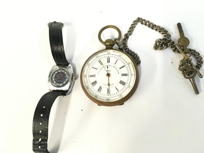 A small vintage Buler wrist watch and a pocket watch with chain.