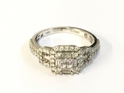 An 18ct whitebgold diamond cluster ring. Size N and 4.35g