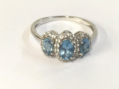 9ct white gold ring set with three aquamarine stones surrounded by diamonds. Size N 1/2 and 2.30g