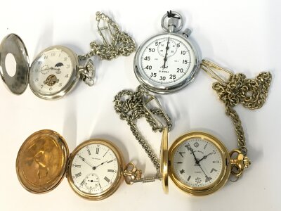 A collection of pocket watches and a stop watch.