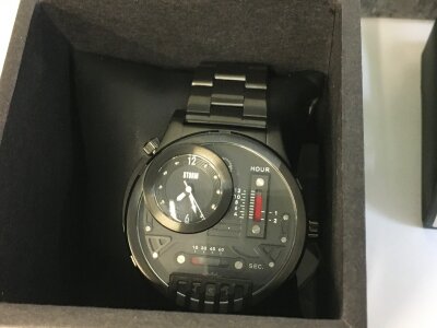 A collection of 5 boxed watches including storm, timed etc.