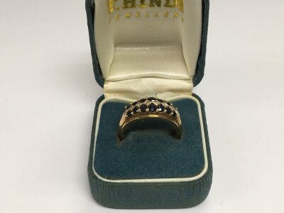 A 9ct gold, sapphire and diamond ring, approx 3.1g and approx size M-N.