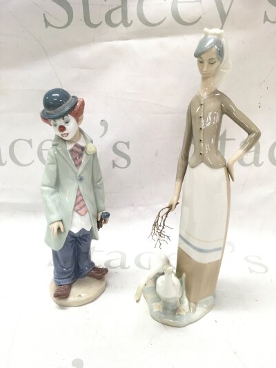 Two Lladro porcelain figures- Girl with geese and clown. 22 and 28cm tall NO RESERVE