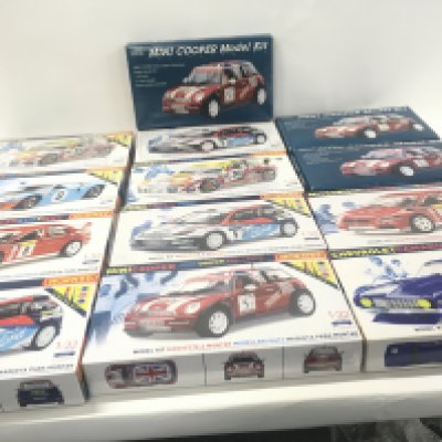 A collection in excess of 12 model car kits by Hornby and Marks and Spencer&rsquo;s
