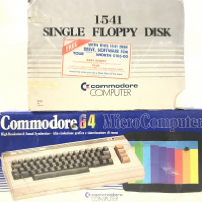 A Boxed Commodore 64 With Disk Drive.2 Boxes Of Games and A Philips Monitor etc . No Reserve. (5).