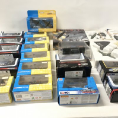 A collection in excess of 20 boxed model military aircraft Corgi and Atlas. No reserve