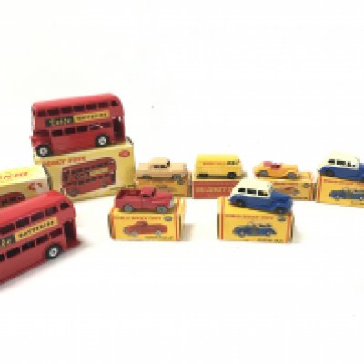 A Collection of Boxed Dinky Toys including 2 X London Buses. 2 X Austin Taxis. A Morris Pick up. A Ford Prefect. A Singer Roadster and a Volkswagen Delivery Van