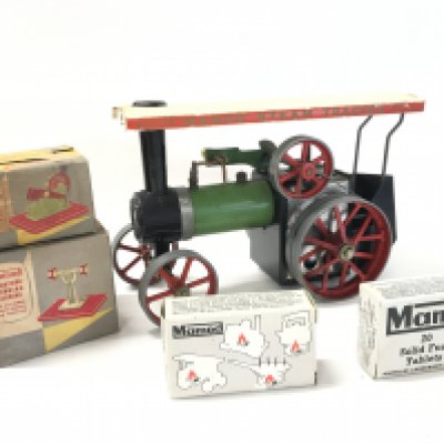 A Mamod Steam Tractor. A Boxed model power Hammer and a boxed miniature Grinding Machine.