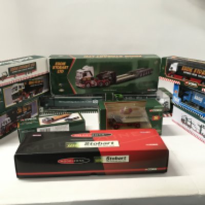 A collection of 12 corgi boxed assorted commercial vehicles all themed Eddie Stobart.