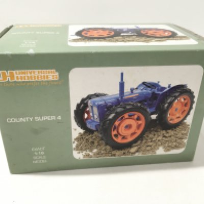 Boxed County Super 4 model tractor by Universal Hobbies 1:16 scale. No reserve
