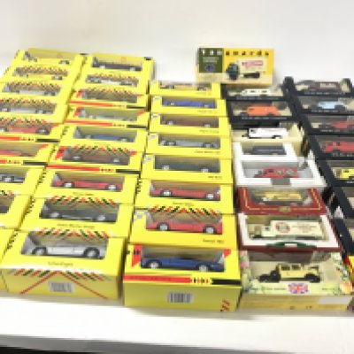 A collection in excess of 40 boxed model vehicles includes Shell sports cars..days gone..vanguards. Etc. Manufacturers include Lledo etc. no reserve