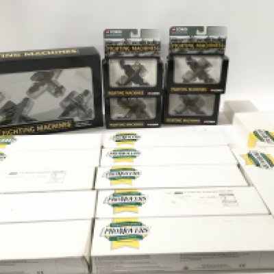 A collection including 5 boxed Corgi Fighting Machines series. Also includes 13 boxed promotional vehicles by Lledo in the Promovers series. No reserve