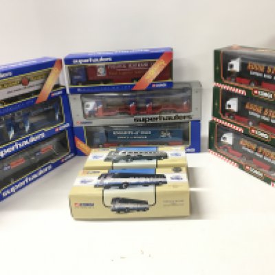A boxed collection of 11 diecast commercial vehicles manufactured by Corgi in the Superhaulers series..plus Eddie Stobart and 2 coaches in the classics range. No reserve (2)