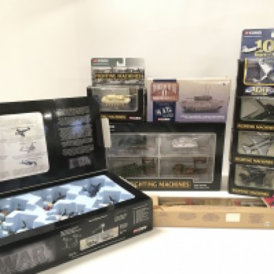 A collection of 9 boxed diecast models by Corgi and Lledo all military themed. Includes a boxed set entitled Fighter Scramble and a boxed set entitled The History of Tank Warfare. Plus others. No reserve
