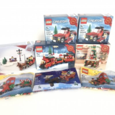 A Collection of Boxed And Sealed Lego Christmas Sets. 2 X Christmas Tree Truck. #40083. A Snow Globe #40223. A Christmas Train #40138. A Seasonal Christmas Set #3300014. 2 X Christmas Trains In Polly Bags and a Father Christmas On Sleigh #400010 in Polly Bag.