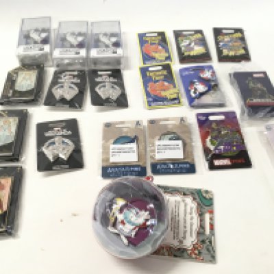 A collection of 20 Disney pins including fantastic four..princess collection etc.