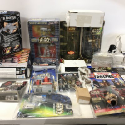A collection Star Wars items including vehicles..figures..cards etc