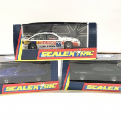 3 Boxed Scalextric Cars. 2 X Ford Capris and A Renault Laguna Ultron.