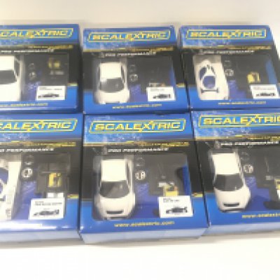 A collection of 6 boxed Scalextric pro performance car assembly kit all unstarted.
