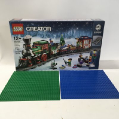 A sealed boxed Lego Creator set # 10254 Winter Holiday Train .. also includes 2x base plates 32x32 blue and green. No reserve.