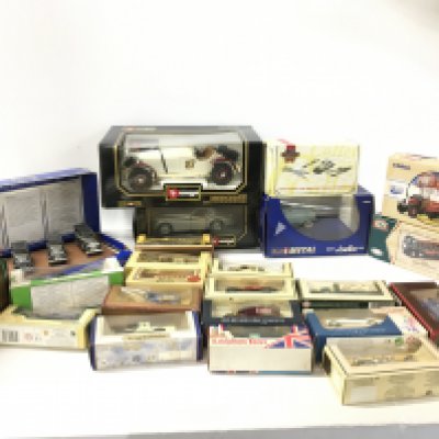 A collection of boxed diecast model cars by Corgi..Burago etc. also includes approximately 15 unboxed Playworn vehicles. No reserve
